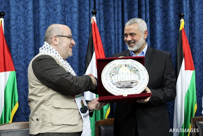 Palestinian Prime Minister in Gaza Strip, Ismail Haniyeh, receives convoy the loyalty to Palestine, in Gaza City on Feb. 28, 2012. Photo by Ahmed Shaat