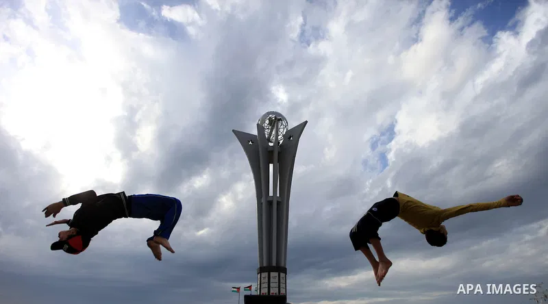 A Palestinian boys enjoys practicing jump on the beach in Gaza City, on Feb. 28, 2012. Photo by Wisam Nassar
