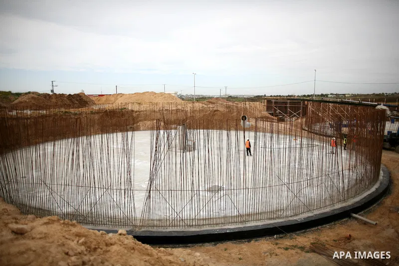Palestinian workers work in building a sewage desalination station in the Northern Gaza Strip on Feb. 26, 2012. The Sewage desalination project is funded by the International Bank and EU with budget 40 million dollar. Th...