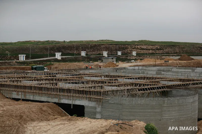 Palestinian workers work in building a sewage desalination station in the Northern Gaza Strip on Feb. 26, 2012. The Sewage desalination project is funded by the International Bank and EU with budget 40 million dollar. Th...