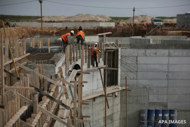 Palestinian workers work in building a sewage desalination station in the Northern Gaza Strip on Feb. 26, 2012. The Sewage desalination project is funded by the International Bank and EU with budget 40 million dollar. Th...