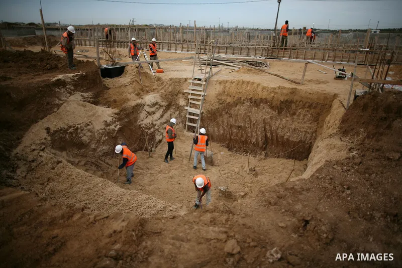 Palestinian workers work in building a sewage desalination station in the Northern Gaza Strip on Feb. 26, 2012. The Sewage desalination project is funded by the International Bank and EU with budget 40 million dollar. Th...