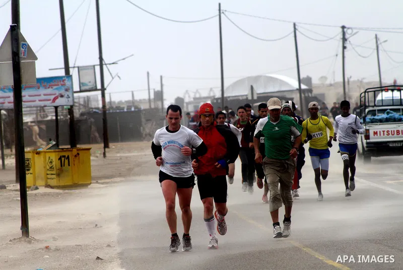 Participants compete in the UN-sponsored Gaza marathon in Gaza City on March 1, 2012. Thousands of runners braved temperatures hovering just above zero degrees centigrade to take part in the impoverished Palestinian terr...