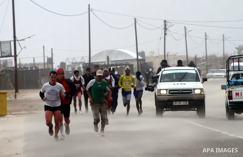 Participants compete in the UN-sponsored Gaza marathon in Gaza City on March 1, 2012. Thousands of runners braved temperatures hovering just above zero degrees centigrade to take part in the impoverished Palestinian terr...