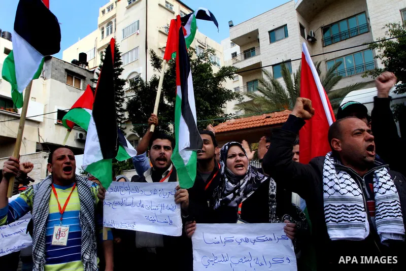 Palestinians demonstrate in solidarity with Hana'a Shalabi during a protest in Gaza City, on mar. 05, 2012. Shalabi, released by Israel in a prisoner swap last year but re-arrested earlier this month and held without cha...
