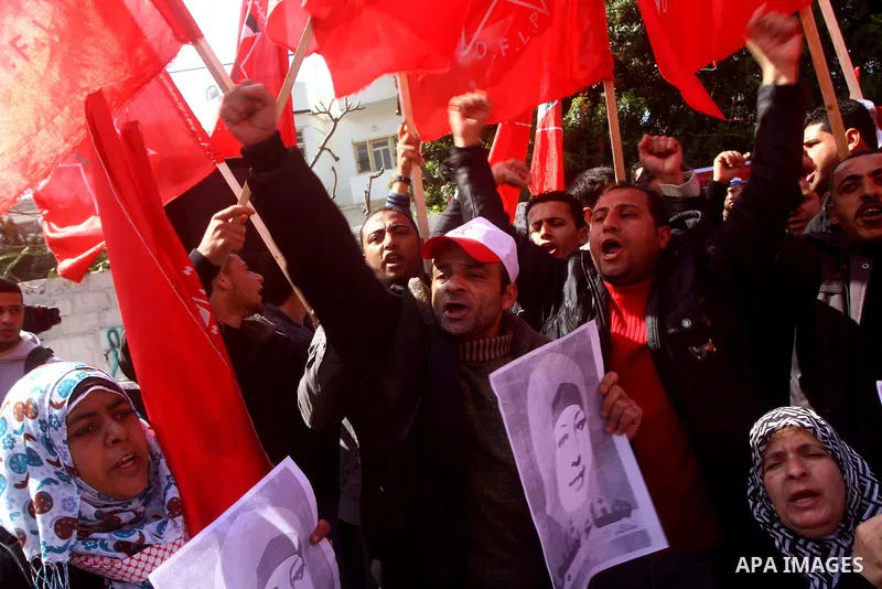 Palestinians demonstrate in solidarity with Hana'a Shalabi during a protest in Gaza City, on mar. 05, 2012. Shalabi, released by Israel in a prisoner swap last year but re-arrested earlier this month and held without cha...
