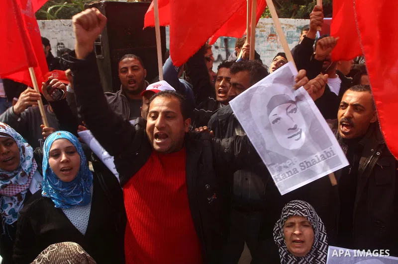 Palestinians demonstrate in solidarity with Hana'a Shalabi during a protest in Gaza City, on mar. 05, 2012. Shalabi, released by Israel in a prisoner swap last year but re-arrested earlier this month and held without cha...