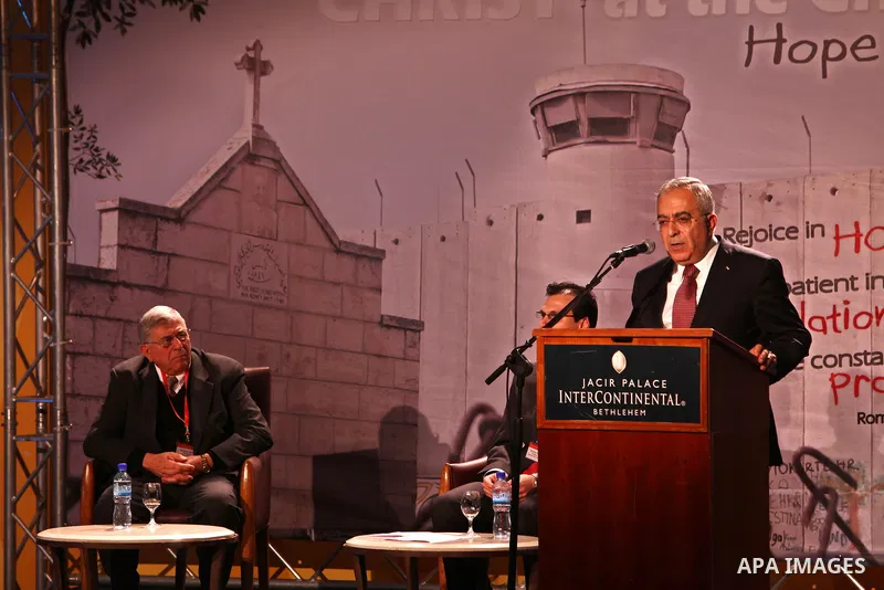 Palestinian Prime Minister, Salam Fayyad, speaks during the world christian conference in the West Bank city of Bethlehem, on Mar. 05, 2012. Photo by Mustafa Abu Dayeh