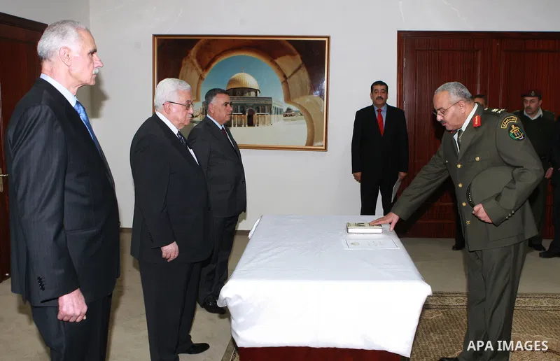 Major General Abdul Latif Sulaiman Al Ayed, swears legal right in front of President Mahmoud Abbas (Abu Mazen) in the West Bank city of Ramallah on March 06, 2012. Photo by Thaer Ganaim