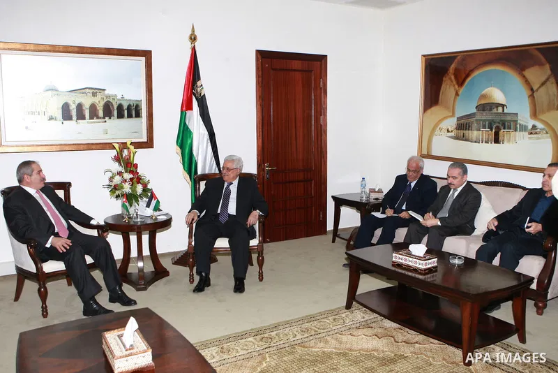 Palestinian President Mahmoud Abbas, meet with with the Jordanian Foreign Minister Nasser Judeh, in the West Bank city of Ramallah, on March 07, 2012. Photo by Thaer Ganaim