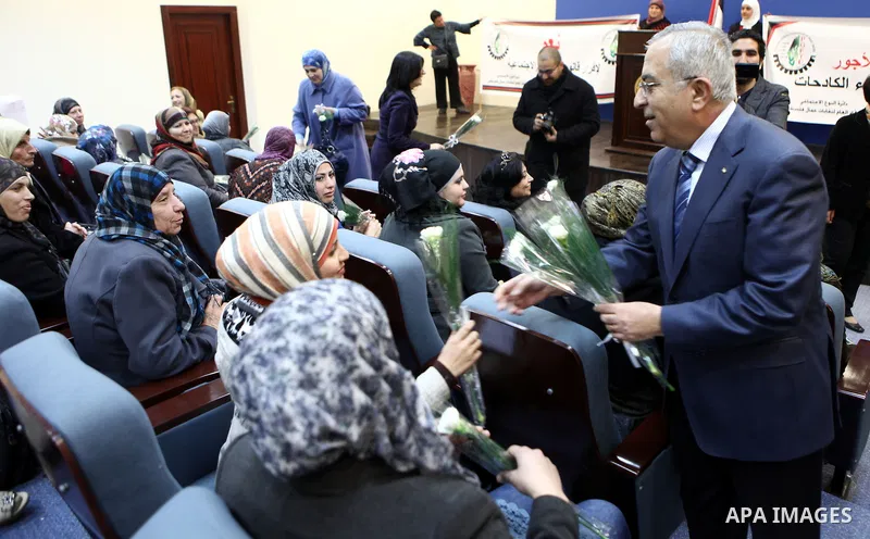 Palestinian Prime Minister, Salam Fayyad, receives Delegation of the women workers in the Federation of trade unions in the West Bank city of Ramallah, on Mar. 07, 2012. Photo by Mustafa Abu Dayeh.