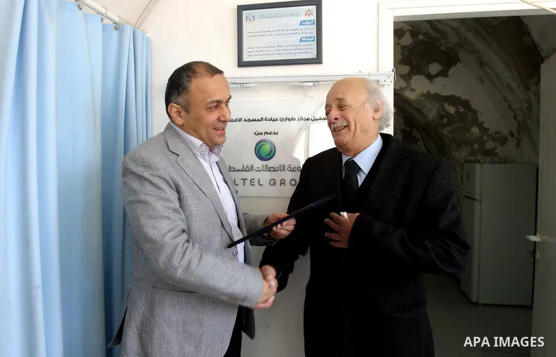 Director of the Arab Center, Adnan Arafa, and Director General of Palestinian Telecommunication Group, Paltel, inaugurate a section of the Medical Center in Al-Aqsa Mosque compound in Jerusalem, March 07, 2012. Photo by...