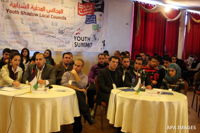 Palestinian Prime Minister Salam Fayyad, participates in the "Palestinian Youth Summit" in the West Bank city of Ramallah, March 07, 2012. Photo by Issam Rimawi