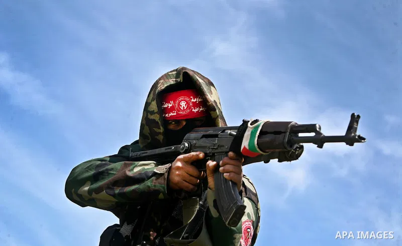 Palestinian militants of the Democratic Front for the Liberation of Palestine (DFLP) take part in a training exercise in front of the media in Rafah in the southern Gaza Strip, Mar. 08, 2012. Photo by Ali Jadallah