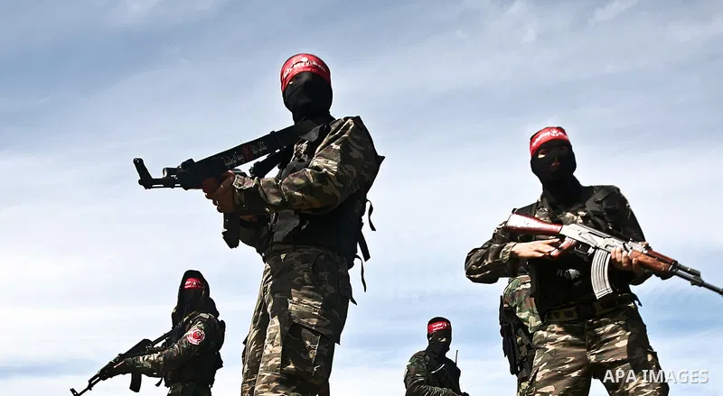 Palestinian militants of the Democratic Front for the Liberation of Palestine (DFLP) take part in a training exercise in front of the media in Rafah in the southern Gaza Strip, Mar. 08, 2012. Photo by Ali Jadallah