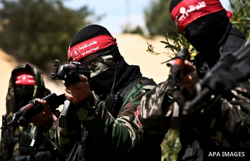 Palestinian militants of the Democratic Front for the Liberation of Palestine (DFLP) take part in a training exercise in front of the media in Rafah in the southern Gaza Strip, Mar. 08, 2012. Photo by Ali Jadallah