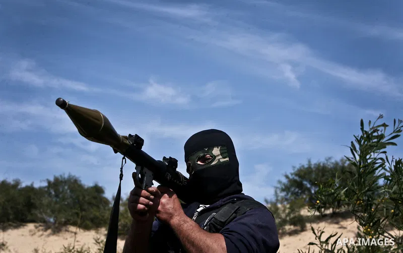 Palestinian militants of the Democratic Front for the Liberation of Palestine (DFLP) take part in a training exercise in front of the media in Rafah in the southern Gaza Strip, Mar. 08, 2012. Photo by Ali Jadallah