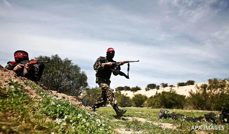Palestinian militants of the Democratic Front for the Liberation of Palestine (DFLP) take part in a training exercise in front of the media in Rafah in the southern Gaza Strip, Mar. 08, 2012. Photo by Ali Jadallah