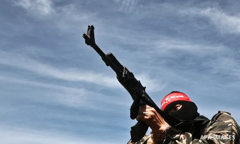 Palestinian militants of the Democratic Front for the Liberation of Palestine (DFLP) take part in a training exercise in front of the media in Rafah in the southern Gaza Strip, Mar. 08, 2012. Photo by Ali Jadallah