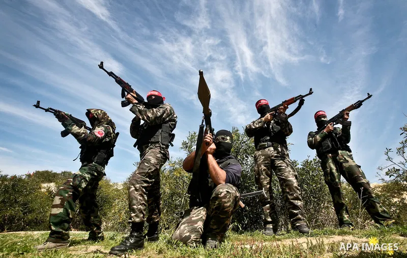 Palestinian militants of the Democratic Front for the Liberation of Palestine (DFLP) take part in a training exercise in front of the media in Rafah in the southern Gaza Strip, Mar. 08, 2012. Photo by Ali Jadallah