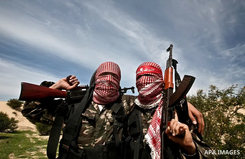 Palestinian militants of the Democratic Front for the Liberation of Palestine (DFLP) take part in a training exercise in front of the media in Rafah in the southern Gaza Strip, Mar. 08, 2012. Photo by Ali Jadallah