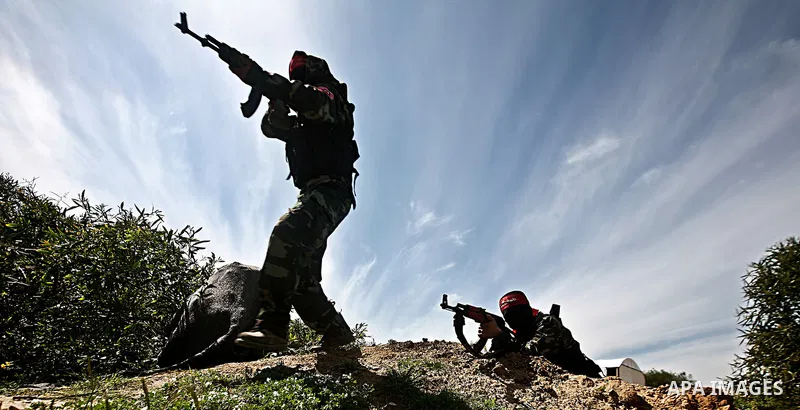 Palestinian militants of the Democratic Front for the Liberation of Palestine (DFLP) take part in a training exercise in front of the media in Rafah in the southern Gaza Strip, Mar. 08, 2012. Photo by Ali Jadallah