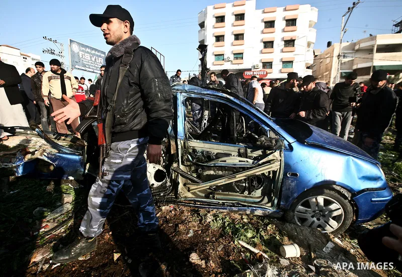 Palestinain policemen inspect the remains of a vehicle after it exploded in Gaza City March 9, 2012. Israel killed the leader of a Palestinian militant faction on Friday in a targeted attack on the car in the Gaza Strip,...
