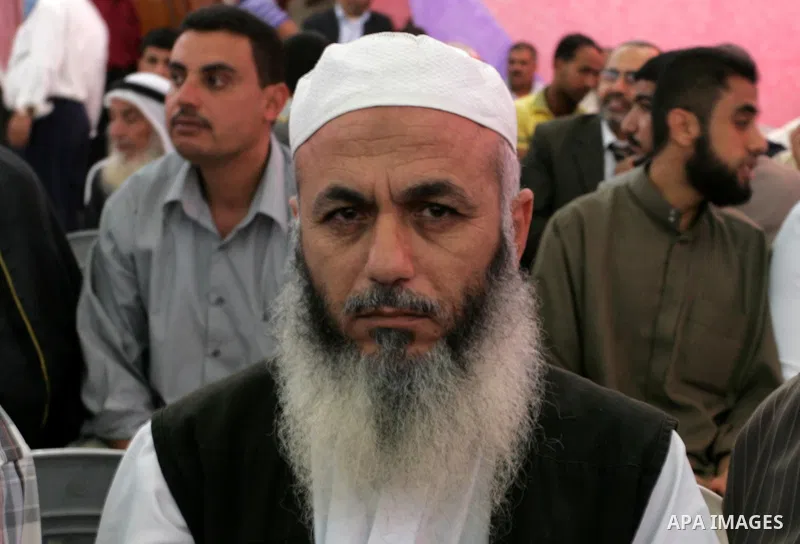 In this Oct. 26, 2011 file photograph, Zuhair al-Qaissi, a secretary-general of the armed wing of the Popular Resistance Committees (PRC) attends a celebration. An Israeli airstrike killed a top Palestinian militant comm...