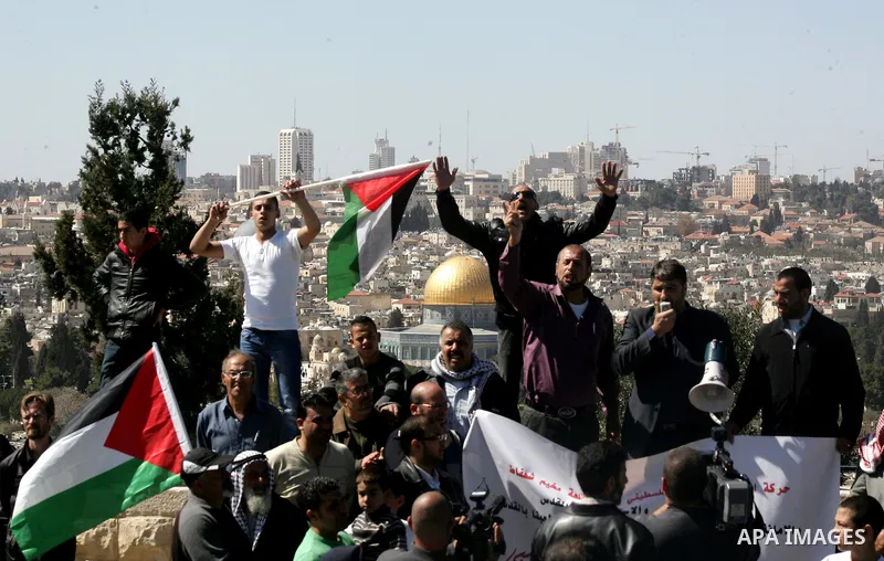 Palestinian protesters demonstrate near the Dome of the Rock in the Al-Aqsa mosque compound against a decision by the Jerusalem municipality and Israel's Nature and Parks Authority (NPA) to build a national park on Pales...