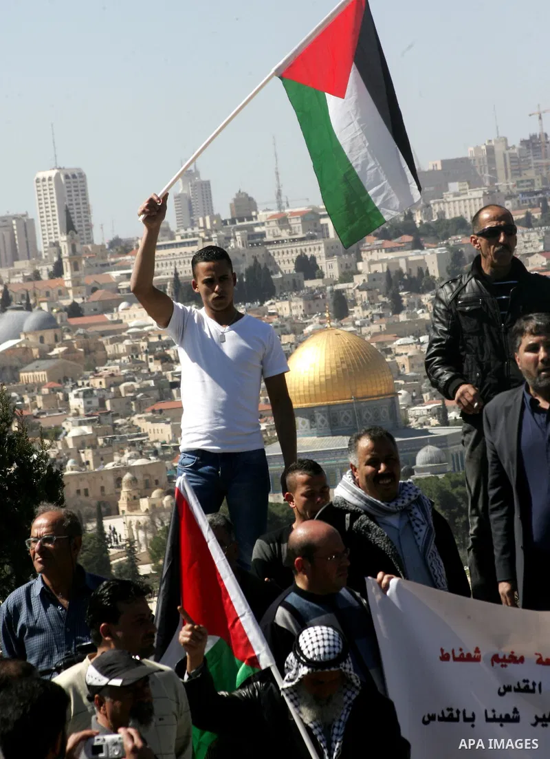 Palestinian protesters demonstrate near the Dome of the Rock in the Al-Aqsa mosque compound against a decision by the Jerusalem municipality and Israel's Nature and Parks Authority (NPA) to build a national park on Pales...