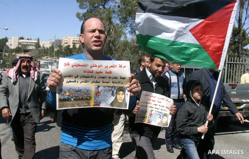 Palestinian protesters demonstrate near the Dome of the Rock in the Al-Aqsa mosque compound against a decision by the Jerusalem municipality and Israel's Nature and Parks Authority (NPA) to build a national park on Pales...