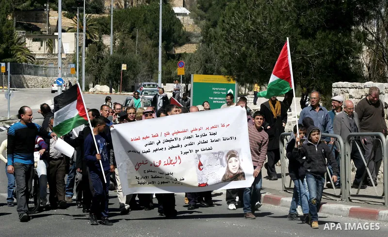 Palestinian protesters demonstrate near the Dome of the Rock in the Al-Aqsa mosque compound against a decision by the Jerusalem municipality and Israel's Nature and Parks Authority (NPA) to build a national park on Pales...