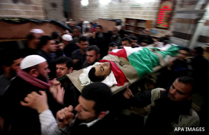 Palestinians carry the bodies of Islamic Jihad militants during their funeral in Gaza March 10, 2012. Israel killed two more Gaza militants on Saturday, raising the death toll in two days of violence to 12 and dozens of...