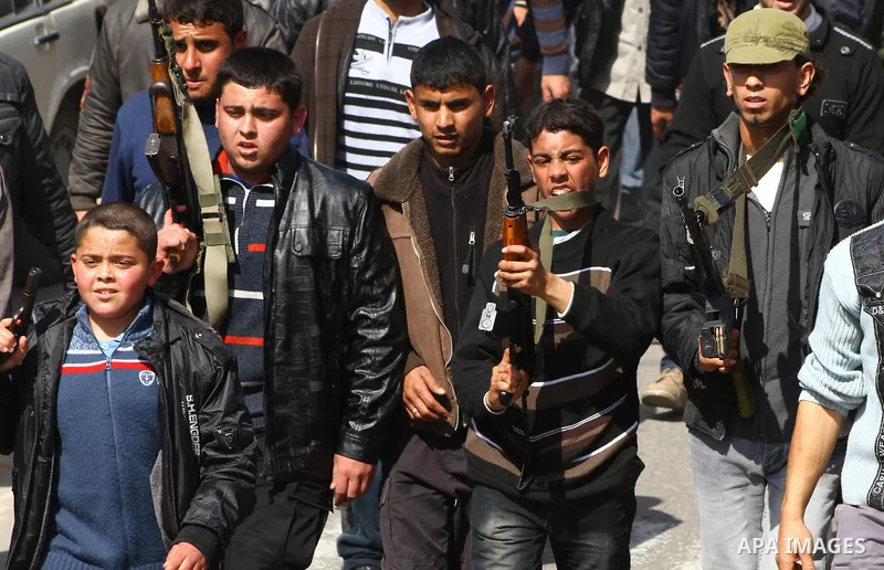 Palestinian mourners carry the bodies of seven Islamic Jihad militants (not seen in picture), who were killed in Israeli air strikes, during their funeral in Gaza City on March 10, 2012. Twelve Palestinian fighters were...