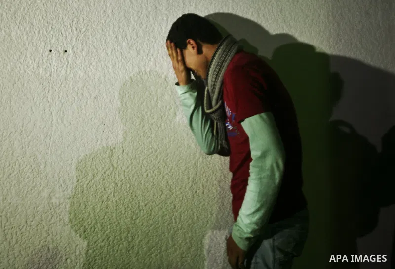 Relatives of Ahmed salem, 22-year-old, grieves over his body in the morgue of Al-Shifa hospital in Gaza City, on March 11, 2012, following a fresh Israeli air raid, bringing the death toll from strikes since March 10 to...