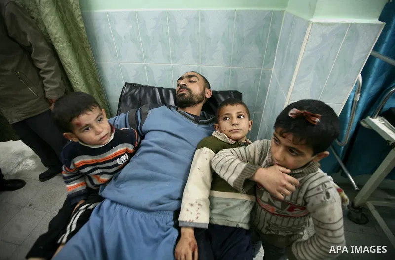 Wounded Palestinian children receive medical atttention at a hospital in Beit Lahia in the northern Gaza Strip on March 12, 2012, following an Israeli air raid. Israeli war planes carried out new air strikes on Gaza over...