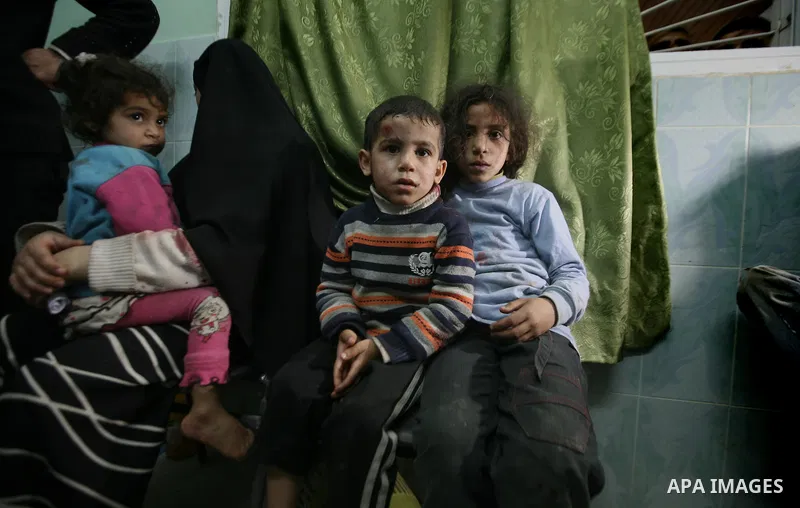 Wounded Palestinian children receive medical atttention at a hospital in Beit Lahia in the northern Gaza Strip on March 12, 2012, following an Israeli air raid. Israeli war planes carried out new air strikes on Gaza over...