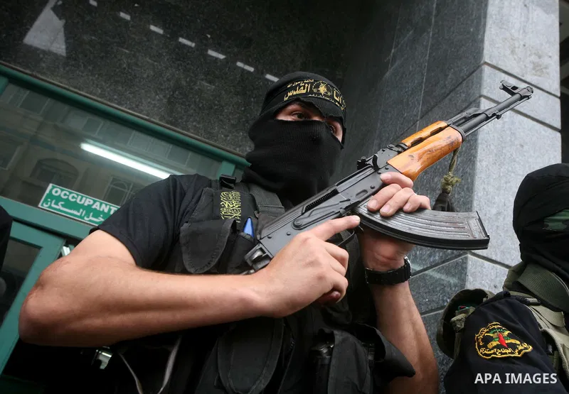 Islamic Jihad militants hold a news conference in Gaza City March 12, 2012. Israeli air strikes killed two Palestinian militants and a civilian in the Gaza Strip on Monday in a fourth day of cross-border hostilities, med...