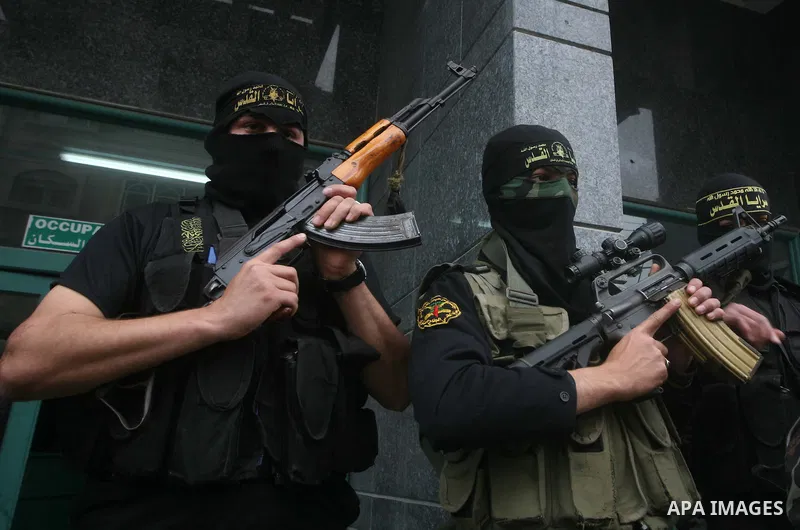 Islamic Jihad militants hold a news conference in Gaza City March 12, 2012. Israeli air strikes killed two Palestinian militants and a civilian in the Gaza Strip on Monday in a fourth day of cross-border hostilities, med...