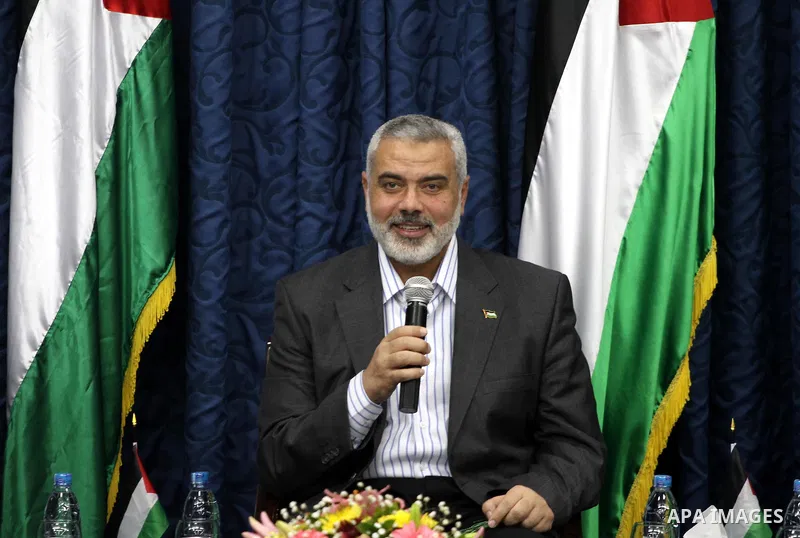 Palestinian Prime Minister in Gaza Strip, Ismail Haniyeh, receives convoy of "Miles of Smiles 10" in his office in Gaza City on Mar. 13, 2012. Photo by Mohammed Asad