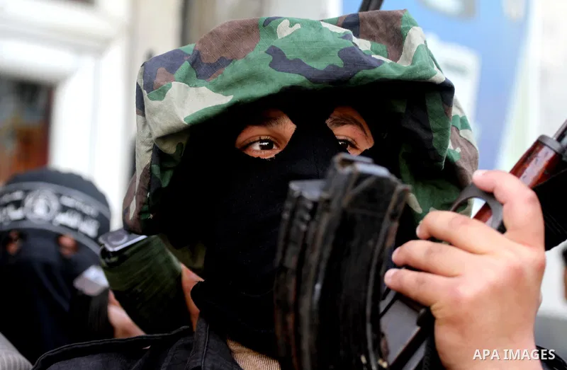 Members of al-Nasser Salah el dein brigades, attend press conference, in Gaza City, on Mar. 13, 2012. Photo by Mohammed Asad