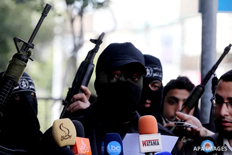 Members of al-Nasser Salah el dein brigades,speak press conference, in Gaza City, on Mar. 13, 2012. Photo by Mohammed Asad