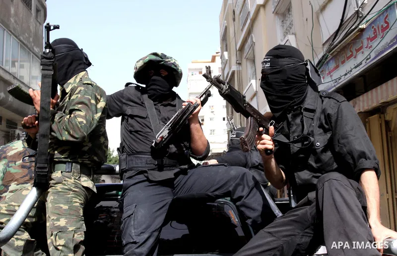 Members of al-Nasser Salah el dein brigades, attend press conference, in Gaza City, on Mar. 13, 2012. Photo by Mohammed Asad