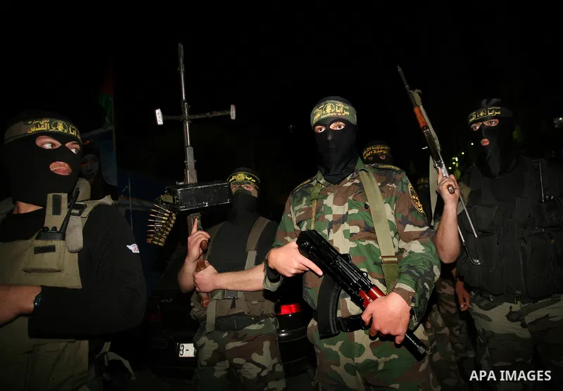 A Palestinian Islamic Jihad militant is seen in Gaza City on 13 March 2012. A fragile truce appeared to be taking hold Tuesday between Israel and Palestinian militias in the Gaza Strip, ending four days of fierce tit-for...