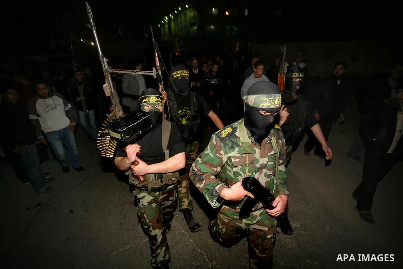 A Palestinian Islamic Jihad militant is seen in Gaza City on 13 March 2012. A fragile truce appeared to be taking hold Tuesday between Israel and Palestinian militias in the Gaza Strip, ending four days of fierce tit-for...