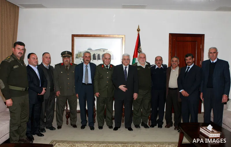 Palestinian President Mahmoud Abbas, (Abu Mazen) meets with staff of the national policy guidance, in the West Bank City of Ramallah, on Mar. 18, 2012. Photo by Thaer Ganaim