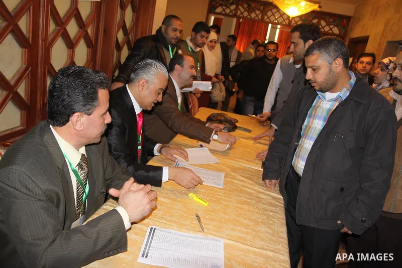 Palestinian journalists cast their votes in the Palestinian journalists syndicate elections in Gaza Strip, in Gaza city on March 18,2012. More than 370 journalist casted their votes in the election on Sunday evening. Pho...
