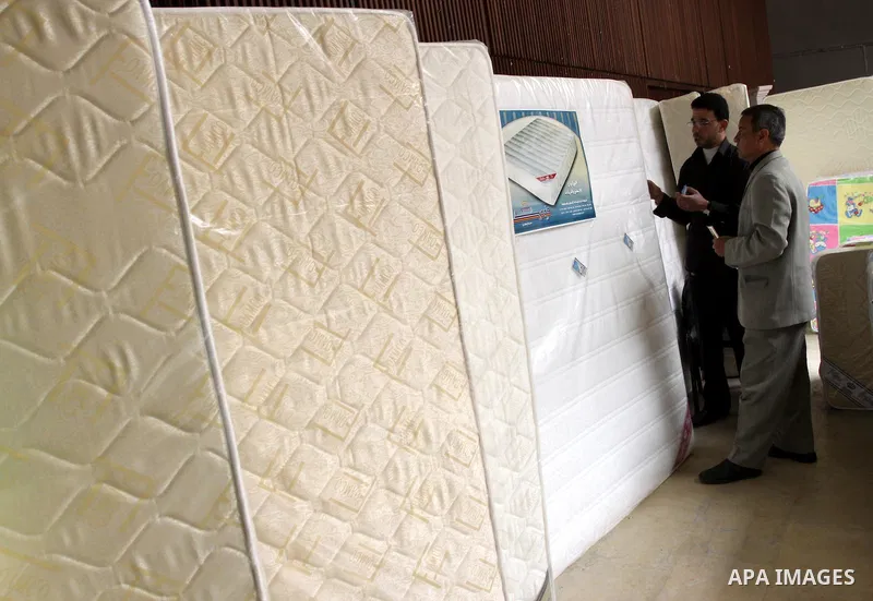 Palestinians attend exhibition for Palestinian wooden Furniture in Gaza City on Mar. 20, 2012. to support the Palestinian national industries. Photo by Mohammed Asad