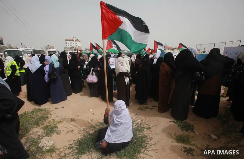 Palestinian women take part in a Hamas rally calling on Egyptian authorities to provide the Gaza Strip with electricity and fuel near the Rafah Border crossing, in the southern Gaza Strip, 20 March 2012. Gazans are repor...