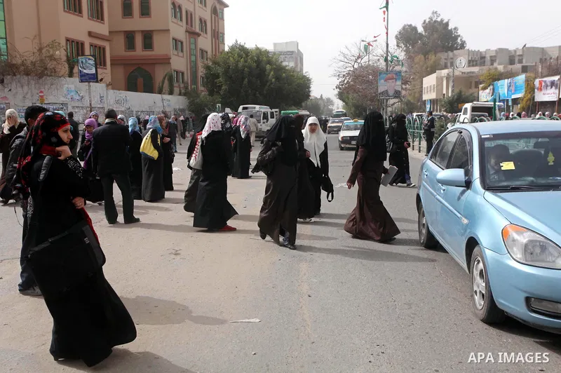 palestinians students wait a taxis in the street after the fuel shortage in Gaza Strip on 20 march 2012. Gaza's top political leader blamed Egypt earlier this month for causing a power crisis that has triggered lengthy b...
